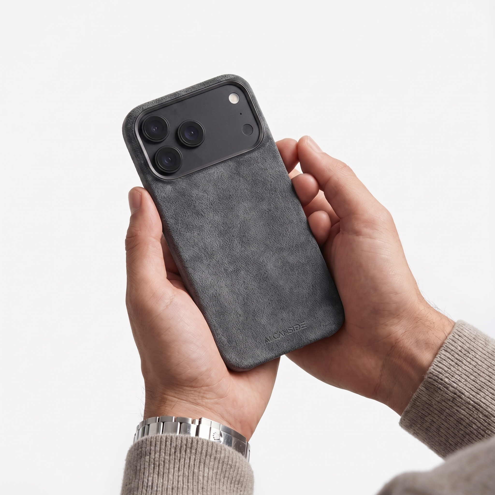 Space Grey Alcantara case for iPhone 18 Pro held in hands
