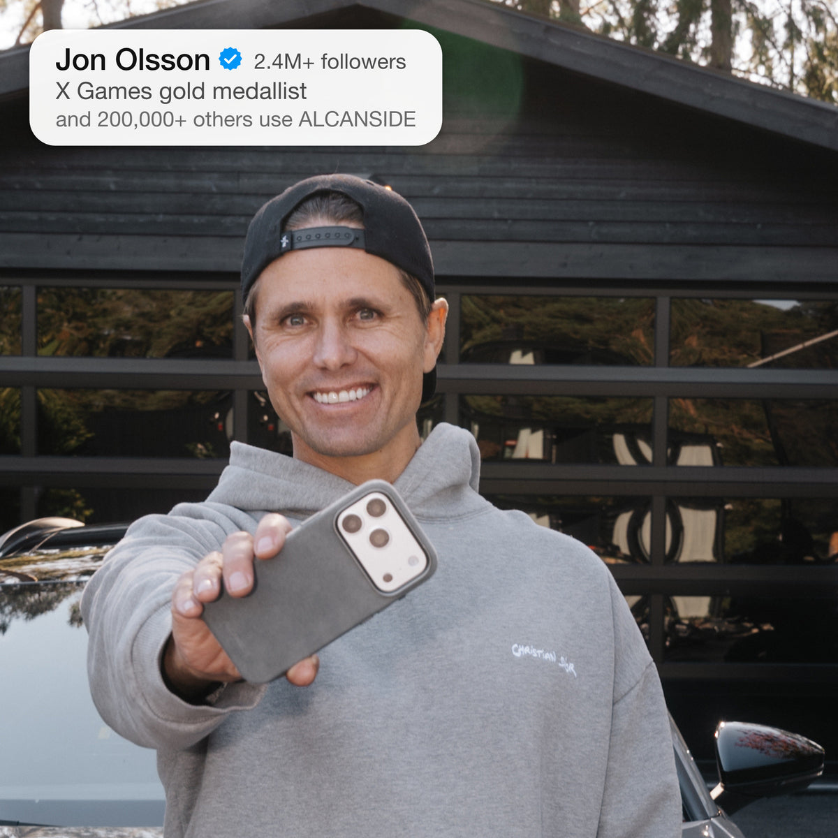 Jon Olsson holding the Nardo Gray Alcantara case for iPhone 18 Pro